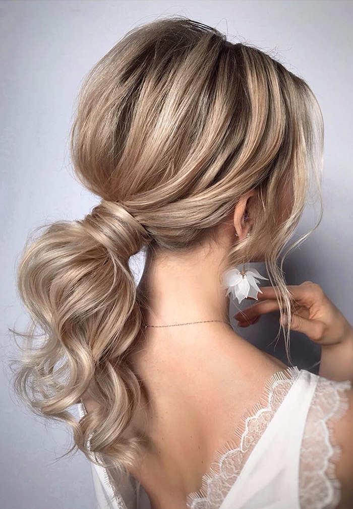 Image of Low ponytail wedding hairstyle for short hair