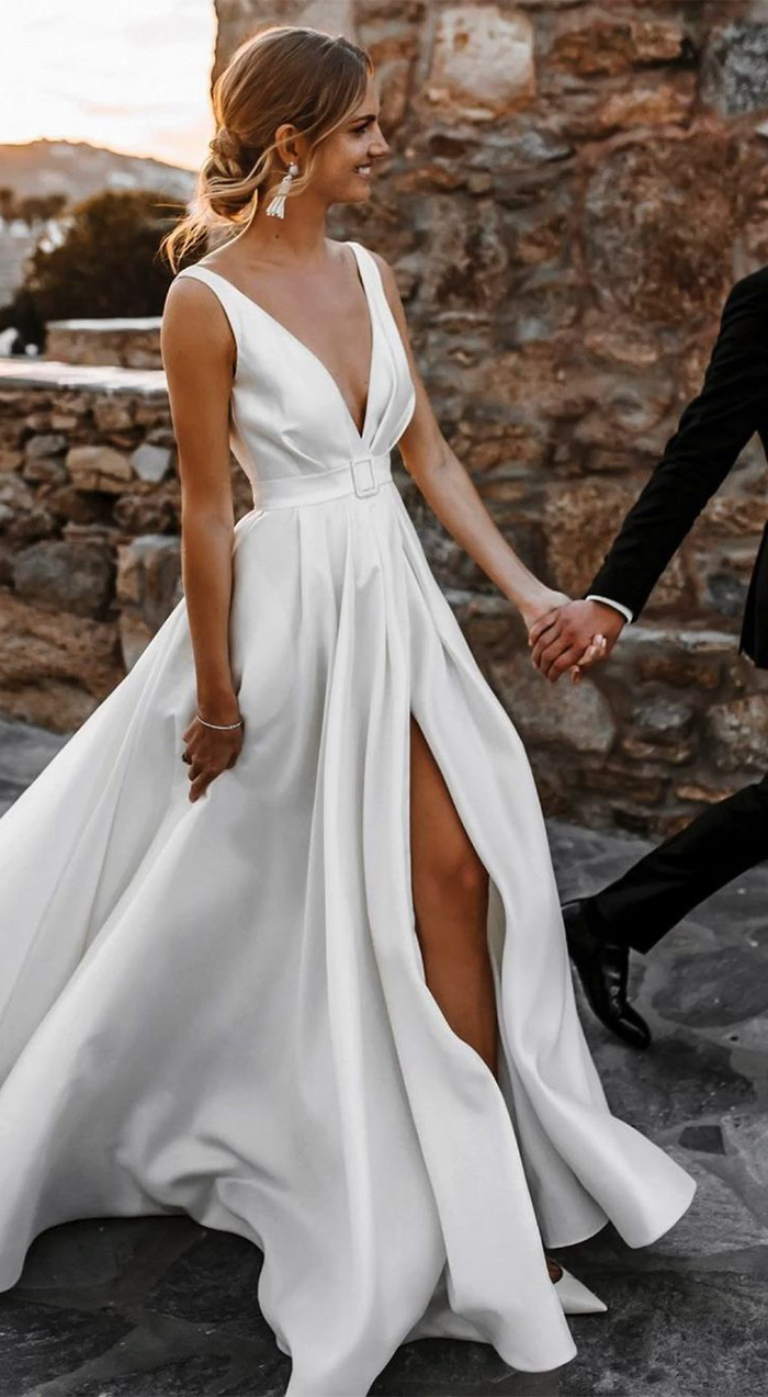 sleek silhouette wedding dresses with high slits for modern brides